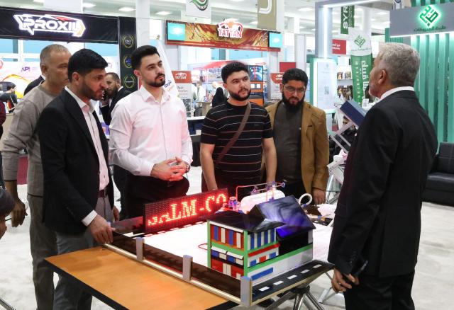 (251112) -- DAMASCUS, Nov. 12, 2025 (Xinhua) -- Visitors attend the SyrPetro 2025, an international petroleum, gas, and mineral resources exhibition, in Damascus, Syria, Nov. 12, 2025. (Photo by Ammar Safarjalani/Xinhua)