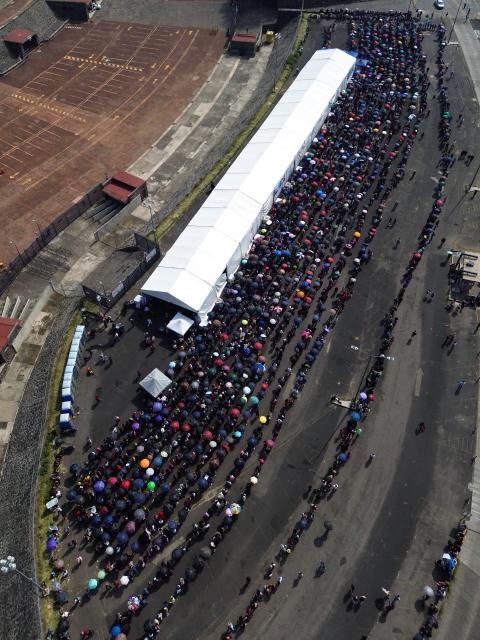 (251112) -- MEXICO CITY, Nov. 12, 2025 (Xinhua) -- This aerial drone photo taken on Nov. 12, 2025 shows a vaccination center in Mexico City, capital of Mexico. Mexico City has set up a vaccination center offering influenza, COVID-19, pneumococcal and measles vaccines to the public as part of efforts to improve community immunization coverage during the winter season. (Photo by Francisco Canedo/Xinhua)