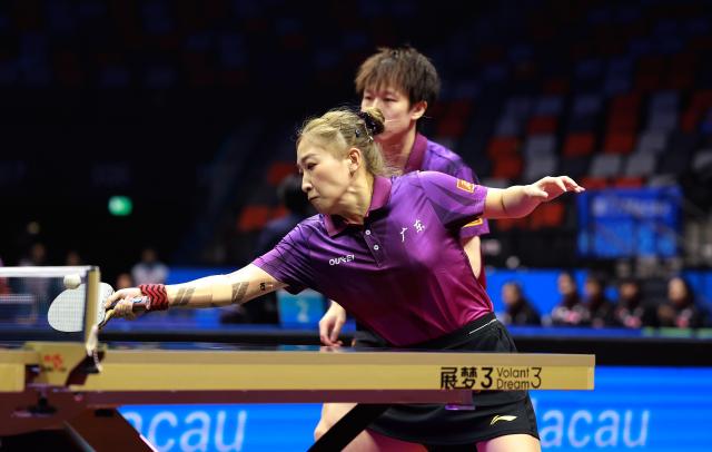 (251113) -- MACAO, Nov. 13, 2025 (Xinhua) -- Lin Gaoyuan/Liu Shiwen (front) compete during the table tennis mixed doubles semifinal match between Lin Gaoyuan/Liu Shiwen of Guangdong and Yuan Licen/Wang Yidi of Liaoning at China's 15th National Games in Macao, south China, Nov. 13, 2025. (Xinhua/Liang Xu)