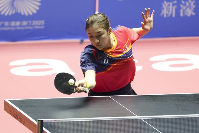 (251113) -- MACAO, Nov. 13, 2025 (Xinhua) -- Chen Meng hits a return during the table tennis women's singles quarterfinal match between Kuai Man of Jiangsu and Chen Meng of Shandong at China's 15th National Games in Macao, south China, Nov. 13, 2025. (Xinhua/Liu Xu)