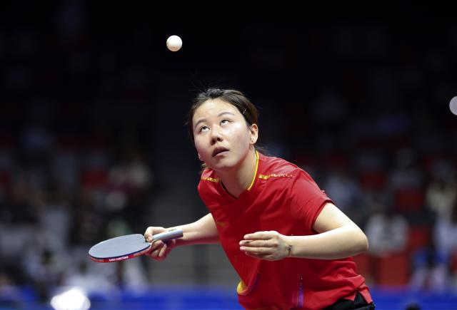 (251113) -- MACAO, Nov. 13, 2025 (Xinhua) -- Chen Xingtong serves during the table tennis women's singles quarterfinal match between Zhu Yuling of Macao and Chen Xingtong of Liaoning at China's 15th National Games in Macao, south China, Nov. 13, 2025. (Xinhua/Liang Xu)