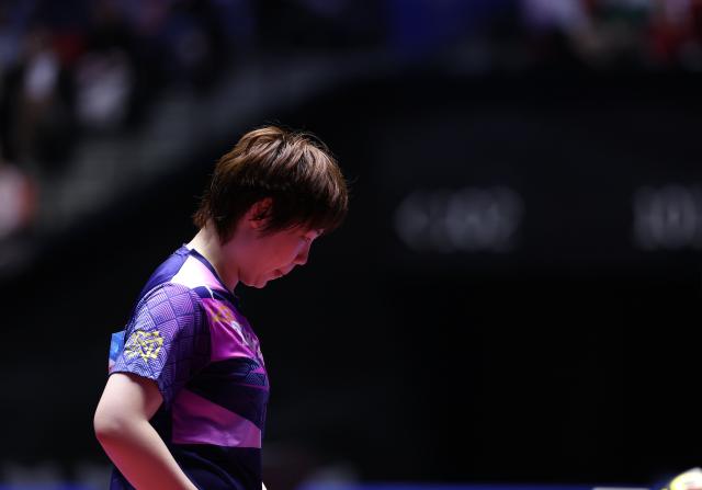 (251113) -- MACAO, Nov. 13, 2025 (Xinhua) -- Kuai Man reacts during the table tennis women's singles quarterfinal match between Kuai Man of Jiangsu and Chen Meng of Shandong at China's 15th National Games in Macao, south China, Nov. 13, 2025. (Xinhua/Chen Bin)