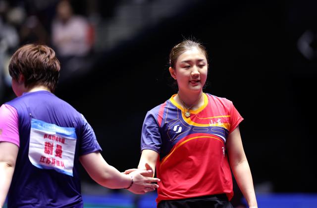 (251113) -- MACAO, Nov. 13, 2025 (Xinhua) -- Chen Meng (R) reacts after winning the table tennis women's singles quarterfinal match between Kuai Man of Jiangsu and Chen Meng of Shandong at China's 15th National Games in Macao, south China, Nov. 13, 2025. (Xinhua/Chen Bin)