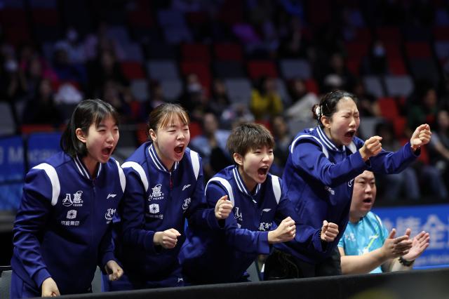 (251113) -- MACAO, Nov. 13, 2025 (Xinhua) -- Members of team Beijing cheer during U18 women's team final match of table tennis between Beijing and Shandong at China's 15th National Games in Macao, south China, Nov. 13, 2025. (Xinhua/Liang Xu)