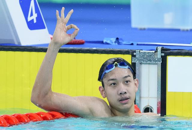 (251113) -- SHENZHEN, Nov. 13, 2025 (Xinhua) -- Zhang Zhanshuo of Shandong reacts after the men's 800m freestyle final of swimming at China's 15th National Games in Shenzhen, south China's Guangdong Province, Nov. 13, 2025. (Xinhua/Du Yu)