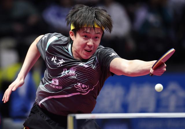 (251113) -- MACAO, Nov. 13, 2025 (Xinhua) -- Wang Chuqin hits a return during the men's singles quaterfinal match of table tennis between Wang Chuqin of Beijing and Lin Gaoyuan of Guangdong at China's 15th National Games in Macao, south China, Nov. 13, 2025. (Xinhua/Liang Xu)