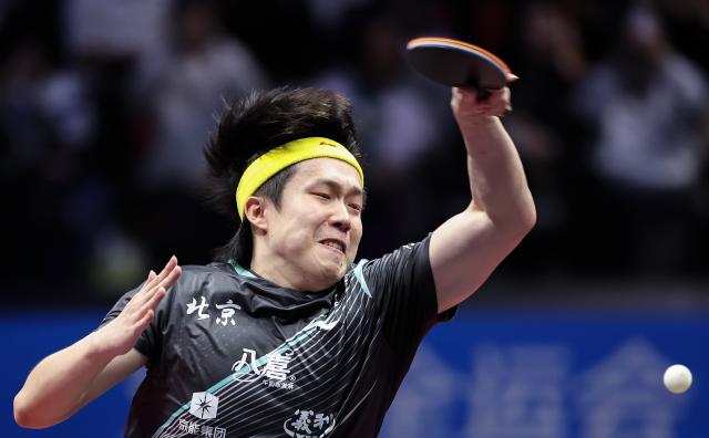 (251113) -- MACAO, Nov. 13, 2025 (Xinhua) -- Wang Chuqin hits a return during the men's singles quaterfinal match of table tennis between Wang Chuqin of Beijing and Lin Gaoyuan of Guangdong at China's 15th National Games in Macao, south China, Nov. 13, 2025. (Xinhua/Liang Xu)