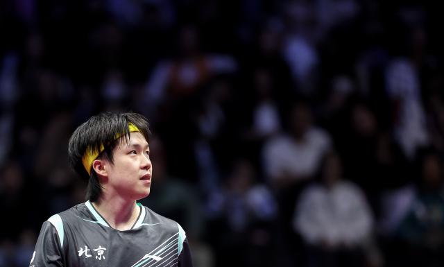(251113) -- MACAO, Nov. 13, 2025 (Xinhua) -- Wang Chuqin reacts during the men's singles quaterfinal match of table tennis between Wang Chuqin of Beijing and Lin Gaoyuan of Guangdong at China's 15th National Games in Macao, south China, Nov. 13, 2025. (Xinhua/Liang Xu)
