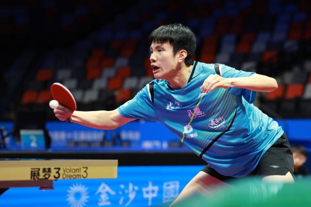 (251113) -- MACAO, Nov. 13, 2025 (Xinhua) -- Huang Youhao of Beijing hits a return while competing against Feng Zehua of Guangdong during the U18 men's team final match of table tennis between Beijing and Guangdong at China's 15th National Games in Macao, south China, Nov. 13, 2025. (Xinhua/Liang Xu)