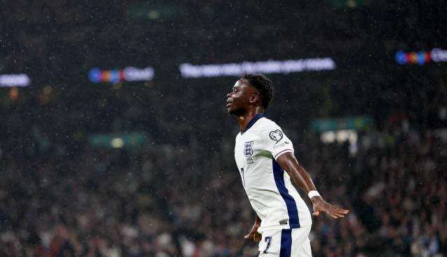(251114) -- LONDON, Nov. 14, 2025 (Xinhua) -- England's Bukayo Saka celebrates scoring during the World Cup 2026 European Qualifiers group K football match between England and Serbia in London, Britain, Nov. 13, 2025. (Xinhua/Li Ying)