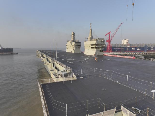 (251114) -- SHANGHAI, Nov. 14, 2025 (Xinhua) -- China's first Type 076 amphibious assault ship, PLANS Sichuan, sets sail from the port of Hudong-Zhonghua Shipbuilding (Group) Co., Ltd. in east China's Shanghai, Nov. 14, 2025.
  PLANS Sichuan set sail from Shanghai on Friday morning to conduct its first navigation test mission. The sea trial will focus on testing and verifying the reliability and stability of the ship's power, electrical and other systems. (Photo by Zhang Liang/Xinhua)