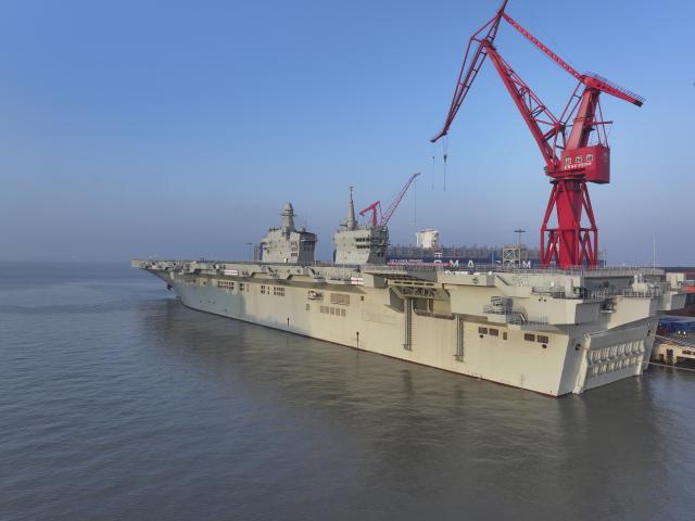 (251114) -- SHANGHAI, Nov. 14, 2025 (Xinhua) -- China's first Type 076 amphibious assault ship, PLANS Sichuan, sets sail from the port of Hudong-Zhonghua Shipbuilding (Group) Co., Ltd. in east China's Shanghai, Nov. 14, 2025.
  PLANS Sichuan set sail from Shanghai on Friday morning to conduct its first navigation test mission. The sea trial will focus on testing and verifying the reliability and stability of the ship's power, electrical and other systems. (Photo by Zhang Liang/Xinhua)