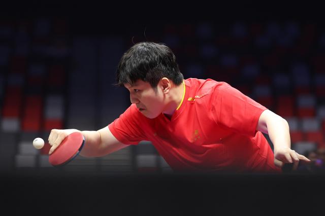 (251114) -- MACAO, Nov. 14, 2025 (Xinhua) -- Fan Zhengdong of Shanghai competes against Sun Wen of Jiangsu during the men's team group A match of table tennis between Shanghai and Jiangsu at China's 15th National Games in Macao, south China, Nov. 14, 2025. (Xinhua/Liang Xu)