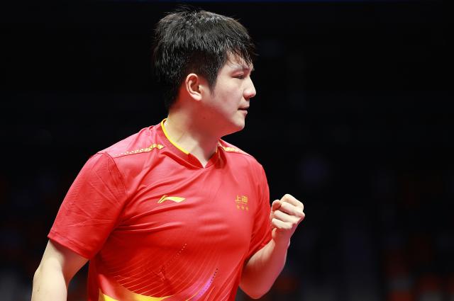 (251114) -- MACAO, Nov. 14, 2025 (Xinhua) -- Fan Zhendong of Shanghai reacts in the match against Sun Wen of Jiangsu during the men's team group A match of table tennis between Shanghai and Jiangsu at China's 15th National Games in Macao, south China, Nov. 14, 2025. (Xinhua/Liang Xu)