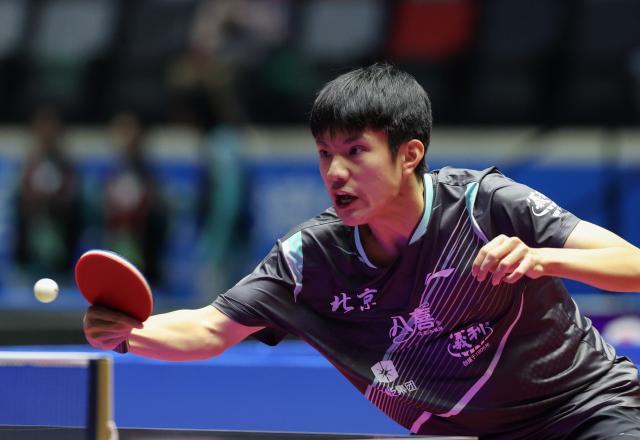 (251114) -- MACAO, Nov. 14, 2025 (Xinhua) -- Huang Youhao of Beijing hits a return during the U18 men's singles semifinal match of table tennis between Wen Ruibo of Hennan and Huang Youhao of Beijing at China's 15th National Games in Macao, south China, Nov. 14, 2025. (Xinhua/Sun Fanyue)