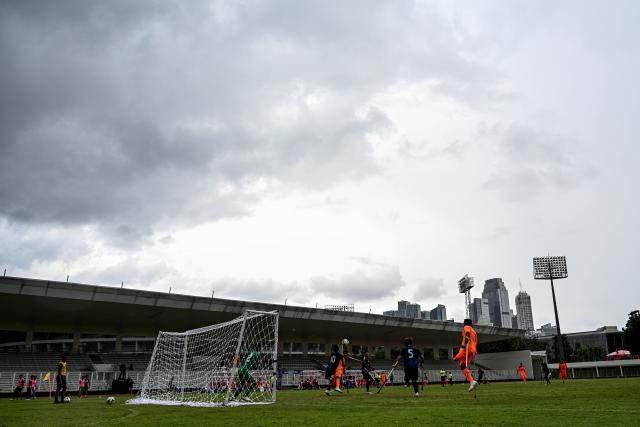 (251114) -- JAKARTA, Nov. 14, 2025 (Xinhua) -- Players of both teams compete during the match between Iran and Japan at the Asian Amputee Football Cup Qualifiers 2025 in Jakarta, Indonesia, Nov. 14, 2025. (Xinhua/Agung Kuncahya B.)