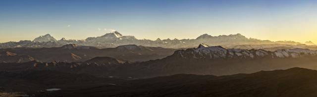 (251114) -- TINGRI, Nov. 14, 2025 (Xinhua) -- A drone photo taken on Nov. 13, 2025 shows a dusk view of Mount Lhotse, Mount Qomolangma, Mount Cho Oyu, and Mount Shishapangma (L to R) in Tingri County of Xigaze, southwest China's Xizang Autonomous Region. (Xinhua/Jiang Fan)