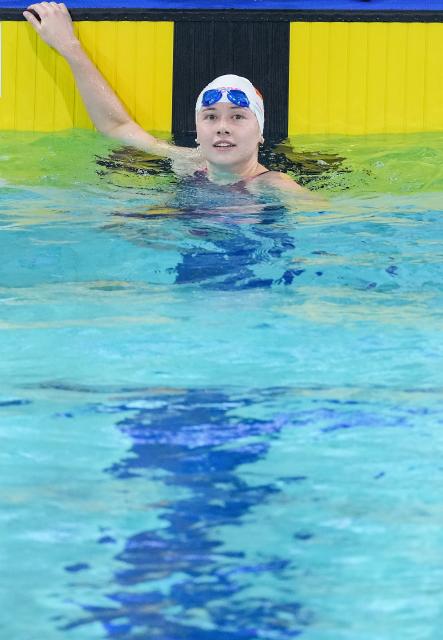 (251114) -- SHENZHEN, Nov. 14, 2025 (Xinhua) -- Siobhan Bernadette Haughey of Hong Kong reacts after the women's 100m freestyle semifinal of swimming at China's 15th National Games in Shenzhen, south China's Guangdong Province, Nov. 14, 2025. (Xinhua/Du Yu)
