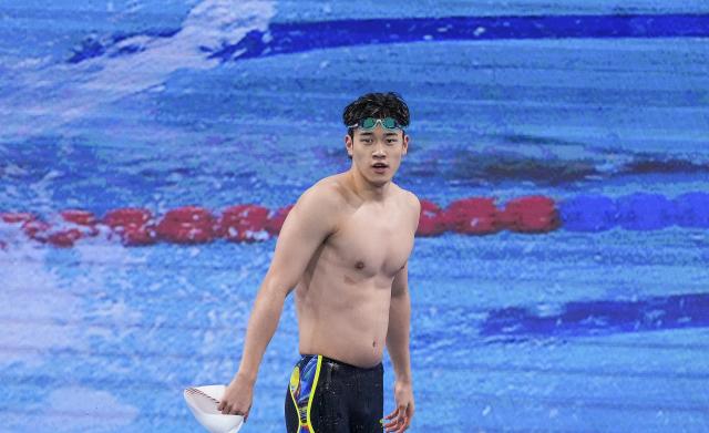 (251114) -- SHENZHEN, Nov. 14, 2025 (Xinhua) -- Pan Zhanle of Zhejiang reacts after the men's 100m freestyle final of swimming at China's 15th National Games in Shenzhen, south China's Guangdong Province, Nov. 14, 2025. (Xinhua/Du Yu)