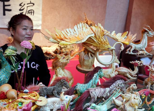 (251114) -- SHANGHAI, Nov. 14, 2025 (Xinhua) -- Straw-weaved products are seen at a fair of intangible cultural heritage products in Yuyuan Garden, Shanghai, east China, Nov. 14, 2025. A series of cultural events were held here to showcase the charm of Chinese intangible cultural heritages. 
   Located near the Bund in central Shanghai, Yuyuan Garden is a landmark attraction in this east China metropolis. Last year, it welcomed a record 2.7 million visitors -- with international tourists comprising nearly one-fourth of that total. (Xinhua/Liu Ying)