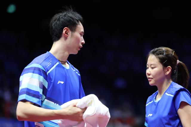 (251114) -- MACAO, Nov. 14, 2025 (Xinhua) -- Chen Xingtong/Xu Haidong (L) are seen during the mixed doubles bronze medal match of table tennis between Chen Xingtong/Xu Haidong of Liaoning and Wang Yidi/Yuan Licen of Liaoning at China's 15th National Games in Macao, south China, Nov. 14, 2025. (Xinhua/Liu Xu)