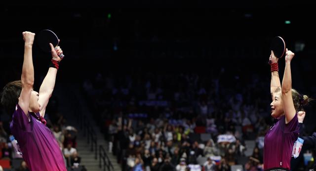 (251114) -- MACAO, Nov. 14, 2025 (Xinhua) -- Lin Gaoyuan/Liu Shiwen (R) celebrate winning the mixed doubles final of table tennis between Chen Yuanyu/Kuai Man of Jiangsu and Lin Gaoyuan/Liu Shiwen of Guangdong at China's 15th National Games in Macao, south China, Nov. 14, 2025. (Xinhua/Sun Fanyue)