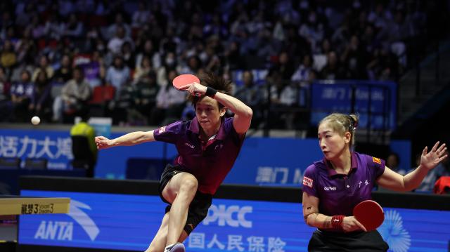 (251114) -- MACAO, Nov. 14, 2025 (Xinhua) -- Lin Gaoyuan (L)/Liu Shiwen compete during the mixed doubles final of table tennis between Chen Yuanyu/Kuai Man of Jiangsu and Lin Gaoyuan/Liu Shiwen of Guangdong at China's 15th National Games in Macao, south China, Nov. 14, 2025. (Xinhua/Sun Fanyue)