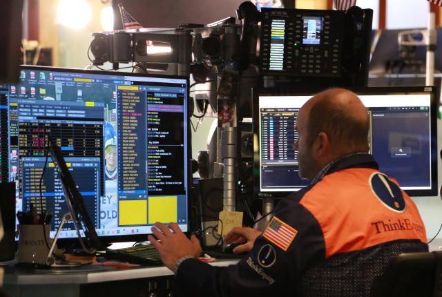 (251114) -- NEW YORK, Nov. 14, 2025 (Xinhua) -- A trader works on the floor of the New York Stock Exchange in New York, the United States, on Nov. 14, 2025. (Xinhua/Liu Yanan)