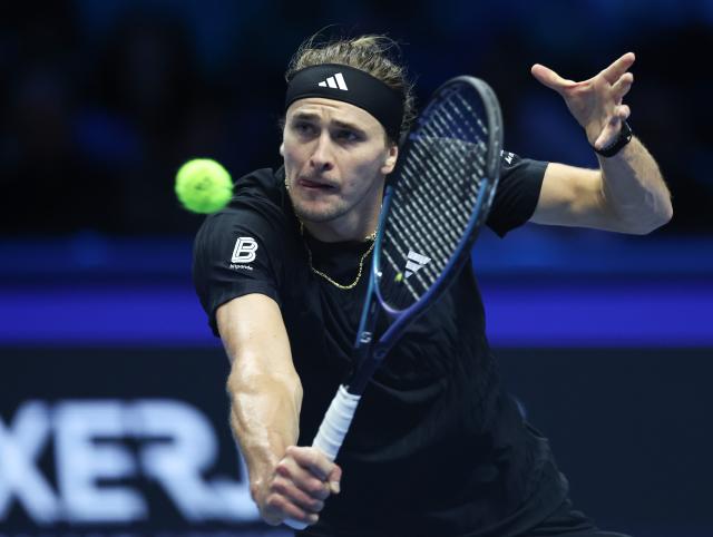 (251115) -- TURIN, Nov. 15, 2025 (Xinhua) -- Alexander Zverev hits a return during the men's singles round robin match between Alexander Zverev of Germany and Felix Auger-Aliassime of Canada at the ATP Finals tennis tournament in Turin, Italy, on Nov. 14, 2025. (Xinhua/Li Jing)