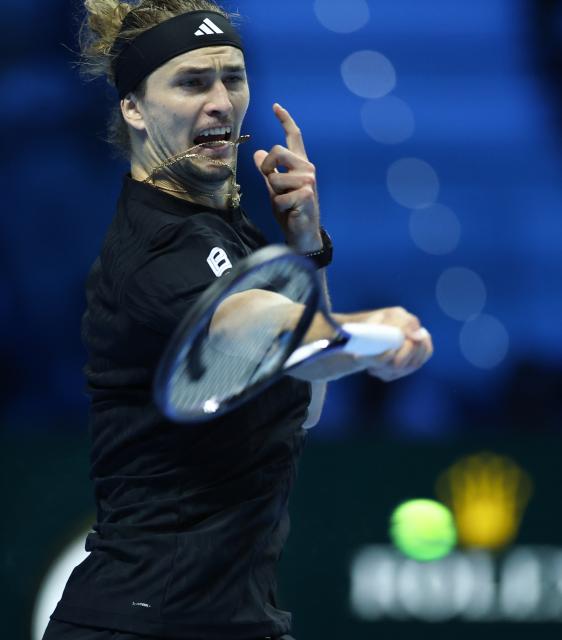 (251115) -- TURIN, Nov. 15, 2025 (Xinhua) -- Alexander Zverev hits a return during the men's singles round robin match between Alexander Zverev of Germany and Felix Auger-Aliassime of Canada at the ATP Finals tennis tournament in Turin, Italy, on Nov. 14, 2025. (Xinhua/Li Jing)