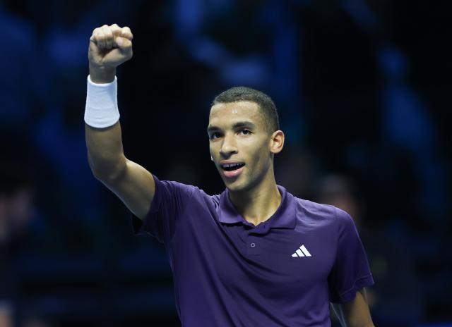 (251115) -- TURIN, Nov. 15, 2025 (Xinhua) -- Felix Auger-Aliassime celebrates after winning the men's singles round robin match between Alexander Zverev of Germany and Felix Auger-Aliassime of Canada at the ATP Finals tennis tournament in Turin, Italy, on Nov. 14, 2025. (Xinhua/Li Jing)