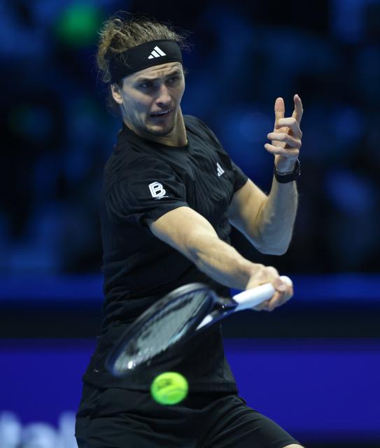 (251115) -- TURIN, Nov. 15, 2025 (Xinhua) -- Alexander Zverev hits a return during the men's singles round robin match between Alexander Zverev of Germany and Felix Auger-Aliassime of Canada at the ATP Finals tennis tournament in Turin, Italy, on Nov. 14, 2025. (Xinhua/Li Jing)