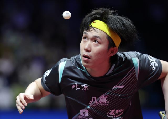 (251115) -- MACAO, Nov. 15, 2025 (Xinhua) -- Wang Chuqin serves during the men's singles semifinal match of table tennis between Fan Zhendong of Shanghai and Wang Chuqin of Beijing at China's 15th National Games in Macao, south China, Nov. 15, 2025. (Xinhua/Liu Xu)