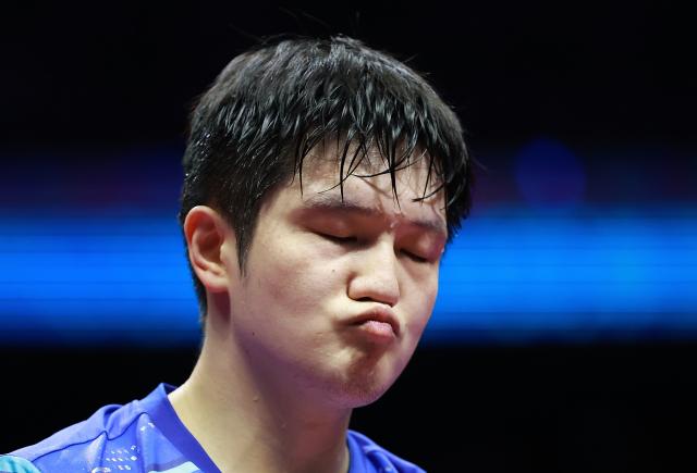 (251115) -- MACAO, Nov. 15, 2025 (Xinhua) -- Fan Zhendong reacts during the men's singles semifinal match of table tennis between Fan Zhendong of Shanghai and Wang Chuqin of Beijing at China's 15th National Games in Macao, south China, Nov. 15, 2025. (Xinhua/Liang Xu)