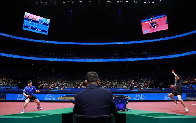 (251115) -- MACAO, Nov. 15, 2025 (Xinhua) -- Fan Zhendong (L) of Shanghai and Wang Chuqin of Beijing compete during their men's singles semifinal match of table tennis at China's 15th National Games in Macao, south China, Nov. 15, 2025. (Xinhua/Liang Xu)
