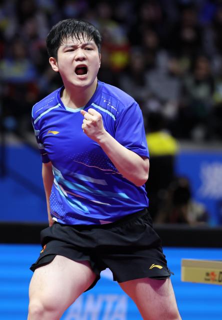 (251115) -- MACAO, Nov. 15, 2025 (Xinhua) -- Fan Zhendong celebrates scoring during the men's singles semifinal match of table tennis between Fan Zhendong of Shanghai and Wang Chuqin of Beijing at China's 15th National Games in Macao, south China, Nov. 15, 2025. (Xinhua/Liu Xu)