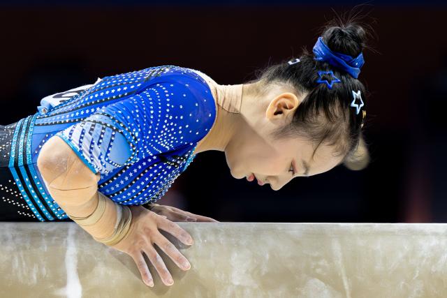 (251115) -- ZHAOQING, Nov. 15, 2025 (Xinhua) -- Qiu Qiyuan of Fujian competes in balance beam during the artistic gymnastics women's individual all-around final at China's 15th National Games in Zhaoqing, south China's Guangdong Province, Nov. 15, 2025. (Xinhua/Du Zixuan)