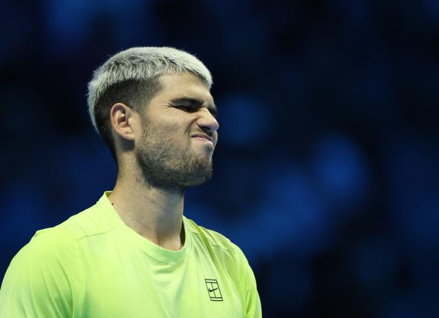 (251116) -- TURIN, Nov. 16, 2025 (Xinhua) -- Carlos Alcaraz reacts after losing a point during the men's singles semifinal match between Carlos Alcaraz of Spain and Felix Auger-Aliassime of Canada at the ATP Finals tennis tournament in Turin, Italy, on Nov. 15, 2025. (Xinhua/Li Jing)