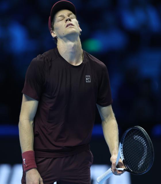 (251116) -- TURIN, Nov. 16, 2025 (Xinhua) -- Jannik Sinner reacts after losing a point during the men's singles semifinal match between Jannik Sinner of Italy and Alex De Minaur of Australia at the ATP Finals tennis tournament in Turin, Italy, on Nov. 15, 2025. (Xinhua/Li Jing)