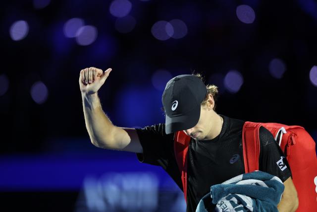 (251116) -- TURIN, Nov. 16, 2025 (Xinhua) -- Alex De Minaur reacts after losing the men's singles semifinal match between Jannik Sinner of Italy and Alex De Minaur of Australia at the ATP Finals tennis tournament in Turin, Italy, on Nov. 15, 2025. (Xinhua/Li Jing)