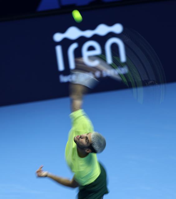 (251116) -- TURIN, Nov. 16, 2025 (Xinhua) -- Carlos Alcaraz serves during the men's singles semifinal match between Carlos Alcaraz of Spain and Felix Auger-Aliassime of Canada at the ATP Finals tennis tournament in Turin, Italy, on Nov. 15, 2025. (Xinhua/Li Jing)