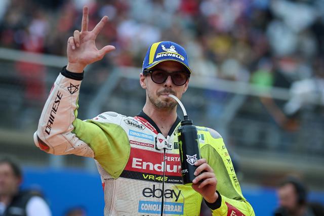 (251116) -- VALENCIA, Nov. 16, 2025 (Xinhua) -- Pertamina Enduro VR46 Racing Team's Fabio Di Giannantonio of Italy reacts after the sprint race of the MotoGP Valencia Grand Prix 2025 at Ricardo Tormo Circuit, Valencia, Spain, Nov. 15, 2025. (Str/Xinhua)