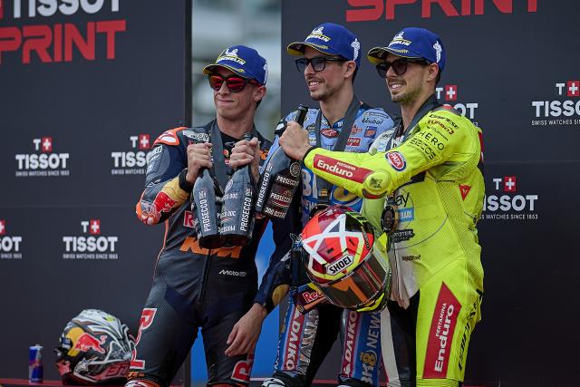 (251116) -- VALENCIA, Nov. 16, 2025 (Xinhua) -- First-placed BK8 Gresini Racing MotoGP's Alex Marquez (C) of Spain, second-placed Red Bull KTM Factory Racing's Pedro Ascosta (L) of Spain and third-placed Pertamina Enduro VR46 Racing Team's Fabio Di Giannantonio of Italy pose after the sprint race of the MotoGP Valencia Grand Prix 2025 at Ricardo Tormo Circuit, Valencia, Spain, Nov. 15, 2025. (Str/Xinhua)
