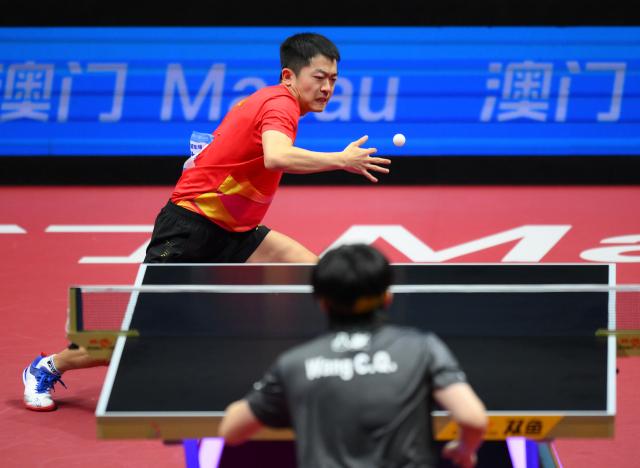 (251116) -- MACAO, Nov. 16, 2025 (Xinhua) -- Yuan Licen (top) competes during the men's singles bronze medal match of table tennis between Wang Chuqin of Beijing and Yuan Licen of Liaoning at China's 15th National Games in Macao, south China, Nov. 16, 2025. (Xinhua/Cheong Kam Ka)
