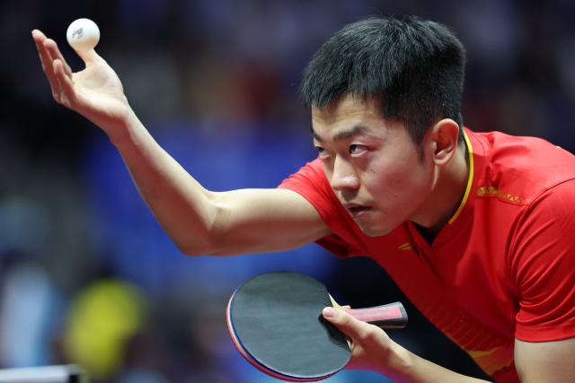 (251116) -- MACAO, Nov. 16, 2025 (Xinhua) -- Yuan Licen serves during the men's singles bronze medal match of table tennis between Wang Chuqin of Beijing and Yuan Licen of Liaoning at China's 15th National Games in Macao, south China, Nov. 16, 2025. (Xinhua/Liu Xu)