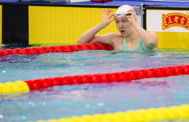 (251116) -- SHENZHEN, Nov. 16, 2025 (Xinhua) -- Yang Chang of Shanxi reacts after the women's 50m breaststroke preliminary of swimming at China's 15th National Games in Shenzhen, south China's Guangdong Province, Nov. 16, 2025. (Xinhua/Tenzin Nyida)