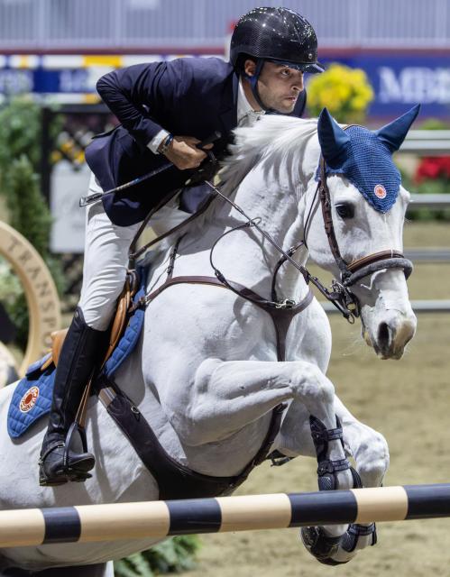 (251116) -- TORONTO, Nov. 16, 2025 (Xinhua) -- Daniel Bluman of Israel competes competes during the jump-off round of the FEI Jumping World Cup Toronto 2025 in Toronto, Canada, on Nov. 15, 2025. (Photo by Zou Zheng/Xinhua)