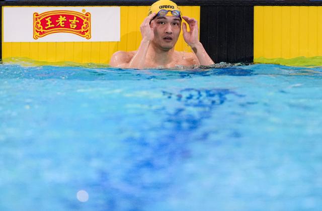 (251116) -- SHENZHEN, Nov. 16, 2025 (Xinhua) -- Xu Jiayu of Zhejiang reacts after the men's 50m backstroke preliminary of swimming at China's 15th National Games in Shenzhen, south China's Guangdong Province, Nov. 16, 2025. (Xinhua/Tenzin Nyida)