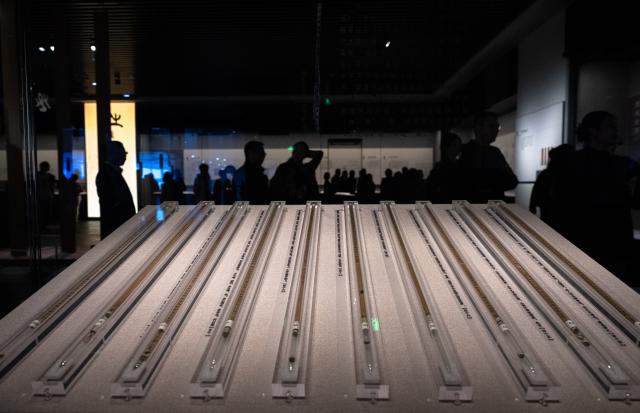 (251116) -- WUHAN, Nov. 16, 2025 (Xinhua) -- This photo taken on Oct. 28, 2025 shows a set of bamboo slips on display during the exhibition "Ancient Chinese Bamboo and Wooden Slips" at the Hubei Provincial Museum in Wuhan, central China's Hubei Province. (Xinhua/Xiao Yijiu)