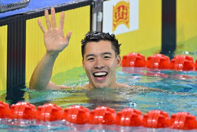 (251116) -- SHENZHEN, Nov. 16, 2025 (Xinhua) -- Ho Ian Yentou of Hong Kong reacts after the men's 50m freestyle final of swimming at China's 15th National Games in Shenzhen, south China's Guangdong Province, Nov. 16, 2025. (Xinhua/Chen Yichen)